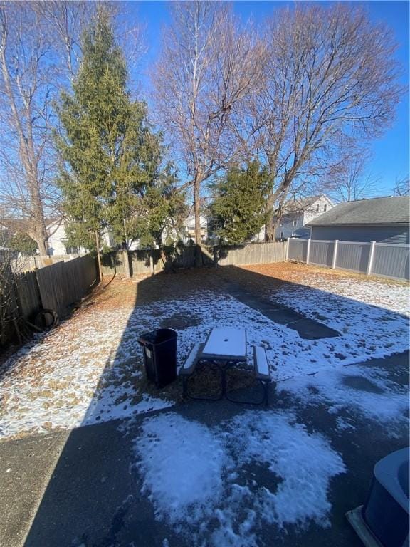 view of yard with a fenced backyard