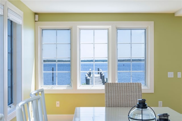 dining area with a water view