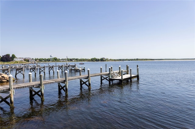 view of dock with a water view