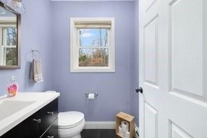 500 Kingstown Rd Unit 3B, Richmond, RI 02892 - bathroom with vanity, baseboards, and toilet