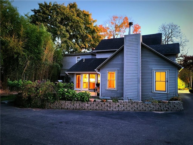 view of front of property with a chimney