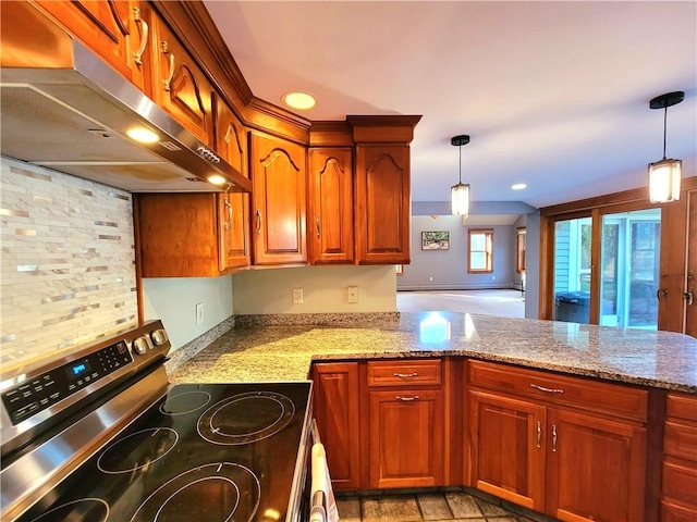 kitchen with under cabinet range hood, hanging light fixtures, stainless steel range with electric stovetop, and brown cabinetry