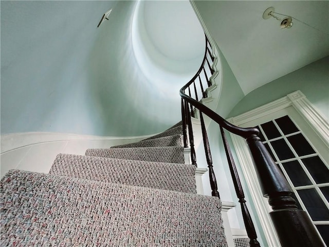 stairs featuring tile patterned floors