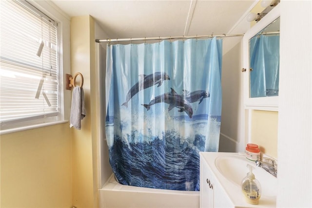 bathroom with vanity and shower / bath combo