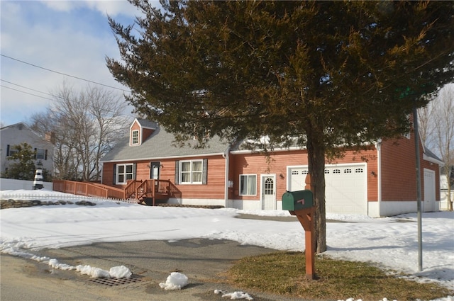 view of front of property featuring an attached garage