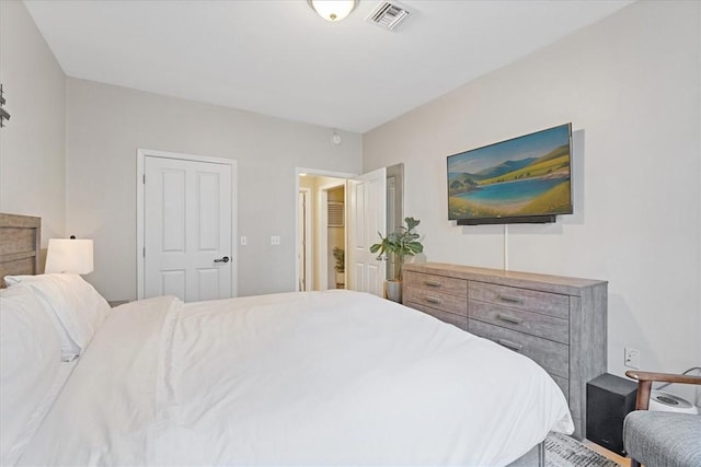 bedroom with visible vents