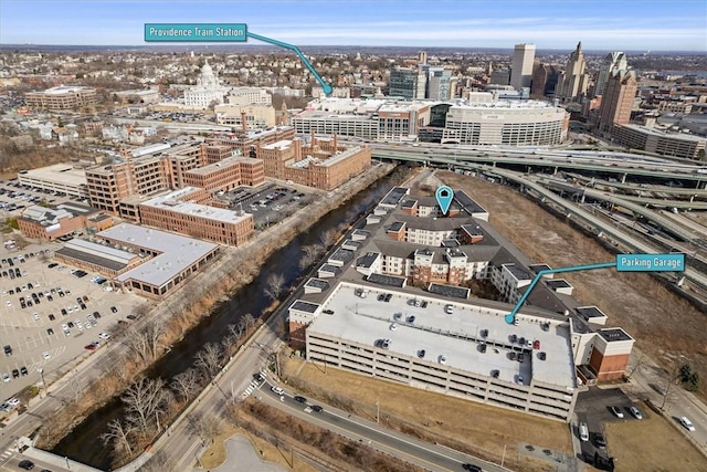 birds eye view of property featuring a city view