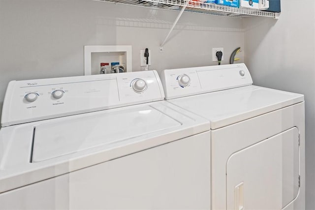 laundry area with washer and dryer