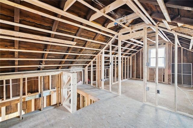 miscellaneous room with lofted ceiling