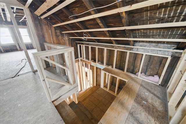 staircase with vaulted ceiling