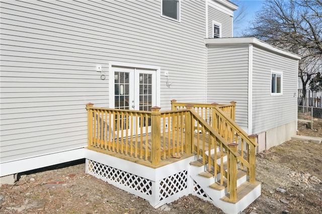 wooden deck with french doors and fence