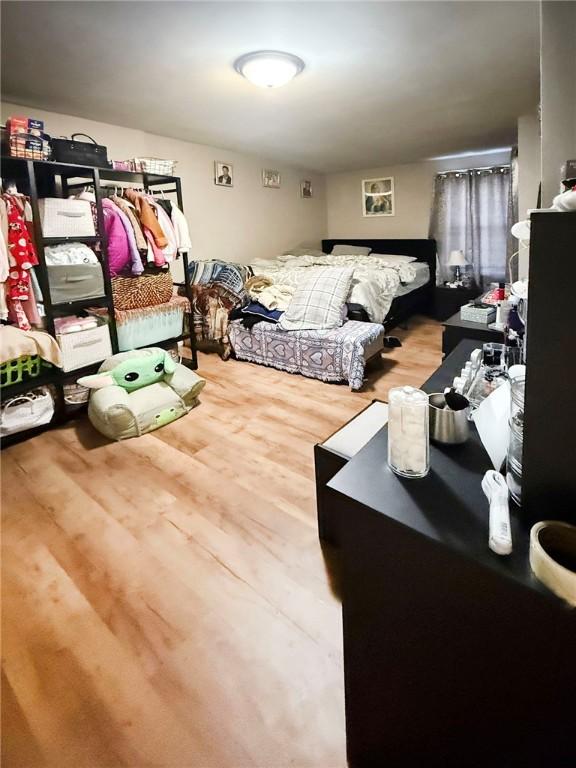 bedroom featuring wood finished floors