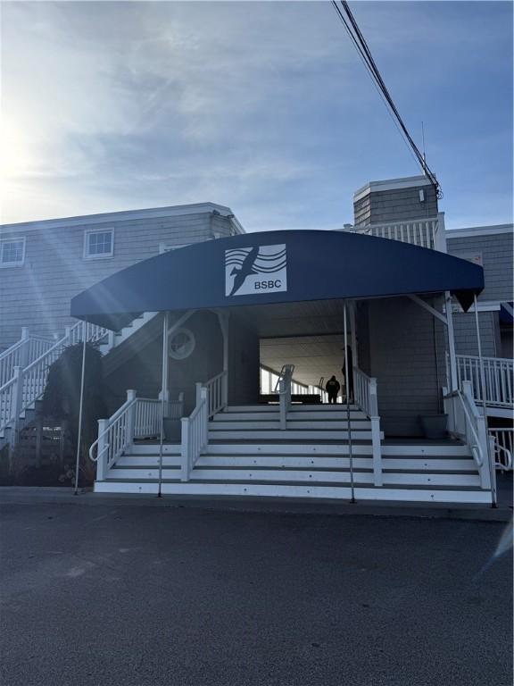 view of front of home featuring stairs