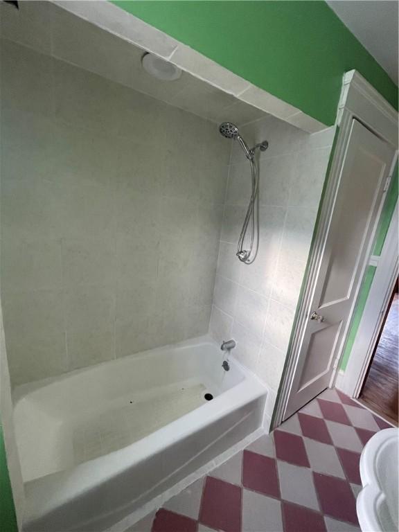 51 Oakland Ave, Cranston, RI 02910 - bathroom with shower / bathtub combination, tile patterned floors, and toilet