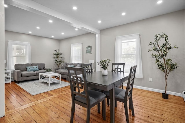 dining area with recessed lighting, light wood-type flooring, and baseboards