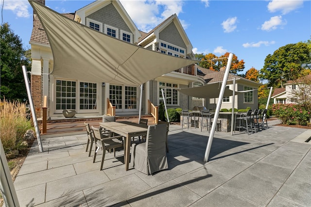 50 Kenyon Ave, East Greenwich, RI 02818 - view of patio with outdoor dining space and entry steps