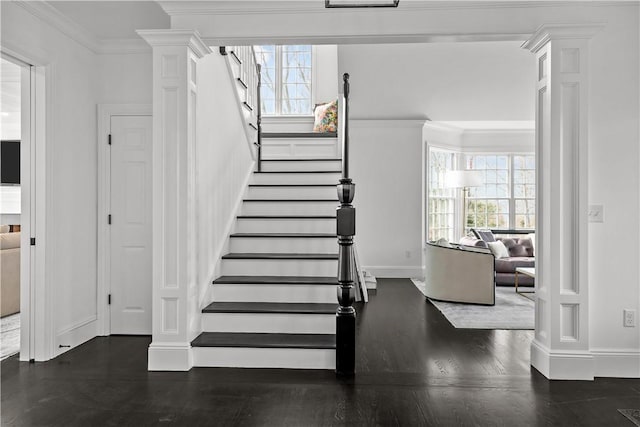 50 Kenyon Ave, East Greenwich, RI 02818 - stairs with baseboards, wood finished floors, and ornamental molding