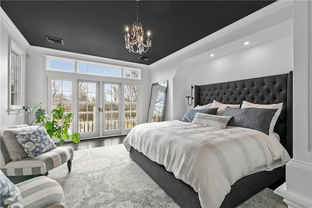 50 Kenyon Ave, East Greenwich, RI 02818 - bedroom with visible vents, a chandelier, ornamental molding, wood finished floors, and access to exterior