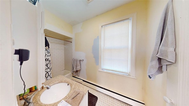 bathroom featuring shower / tub combo and baseboard heating