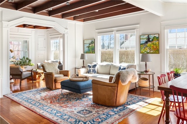 sunroom / solarium with beamed ceiling