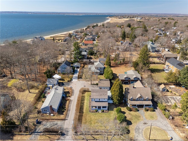 bird's eye view featuring a residential view and a water view