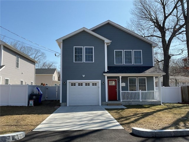 traditional-style house with concrete driveway, a garage, fence, and covered porch