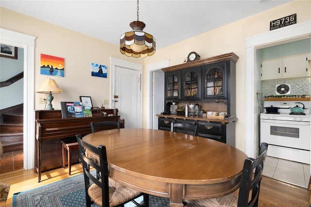 dining area featuring wood finished floors