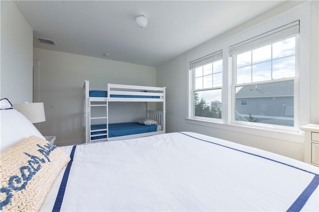 unfurnished bedroom featuring visible vents