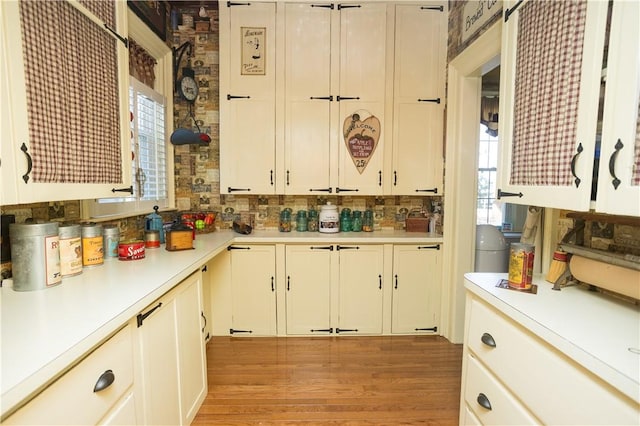 kitchen featuring light countertops and light wood-style flooring