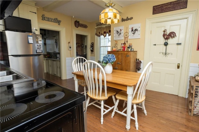 dining room featuring wood finished floors