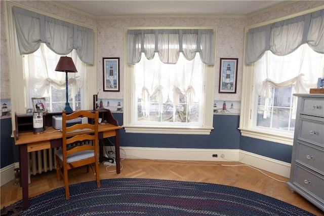 office area with baseboards, ornamental molding, and wallpapered walls