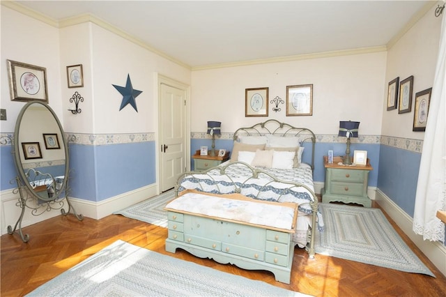 bedroom with a wainscoted wall and ornamental molding