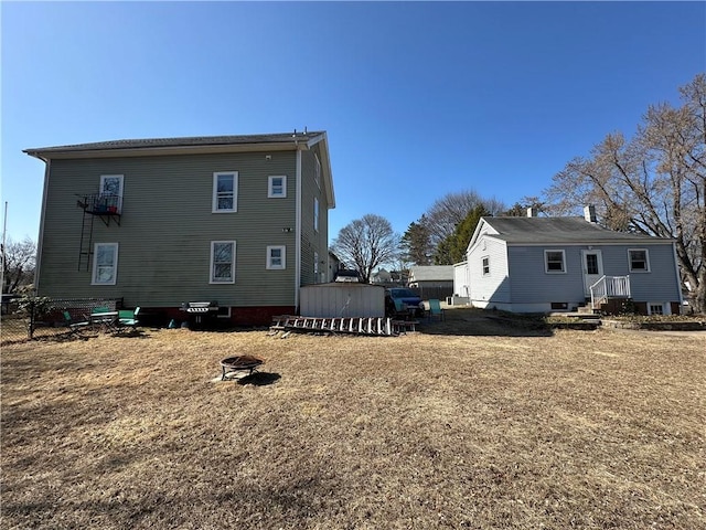 25 N Union St, Lincoln, RI 02865 - back of property featuring a fire pit and fence