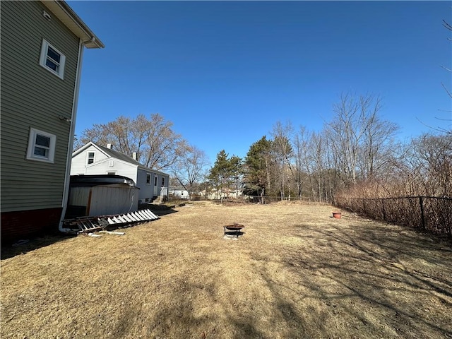 25 N Union St, Lincoln, RI 02865 - view of yard with an outdoor fire pit and fence