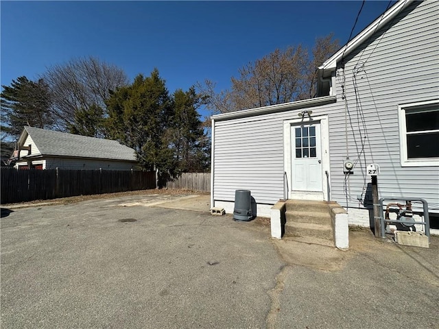 25 N Union St, Lincoln, RI 02865 - doorway to property featuring fence