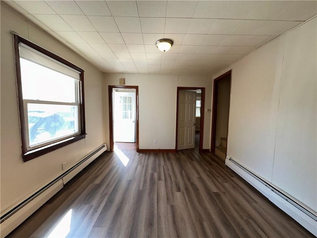 25 N Union St, Lincoln, RI 02865 - unfurnished room with a baseboard radiator, dark wood finished floors, and baseboards