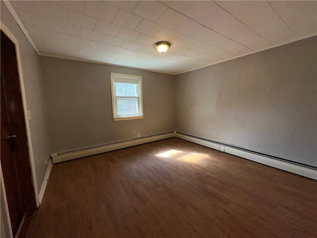 25 N Union St, Lincoln, RI 02865 - empty room featuring wood finished floors, a baseboard radiator, ornamental molding, baseboards, and baseboard heating