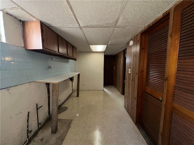 25 N Union St, Lincoln, RI 02865 - corridor featuring a paneled ceiling and light flooring