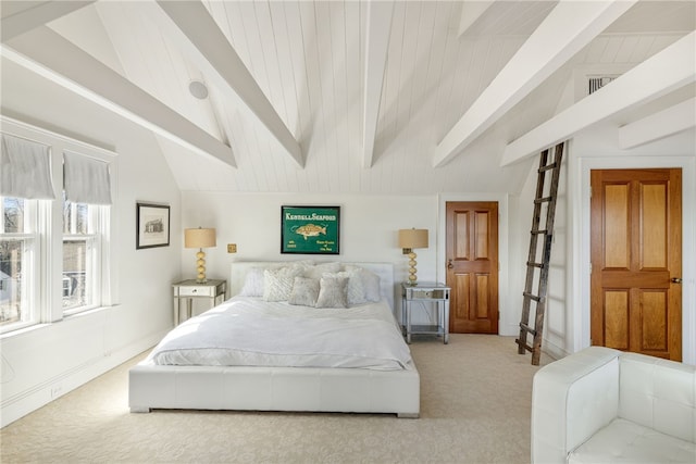 carpeted bedroom with lofted ceiling with beams