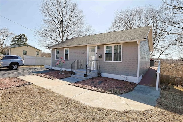 view of front of house with fence