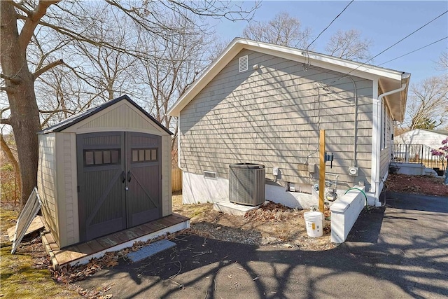 view of shed featuring central AC unit