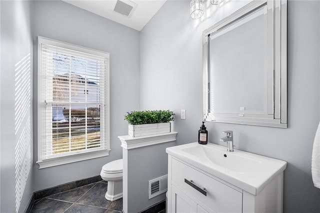 30 Lenihan Ln, East Greenwich, RI 02818 - bathroom featuring toilet, vanity, and baseboards