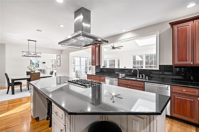 30 Lenihan Ln, East Greenwich, RI 02818 - kitchen with a sink, island exhaust hood, ceiling fan, appliances with stainless steel finishes, and a center island