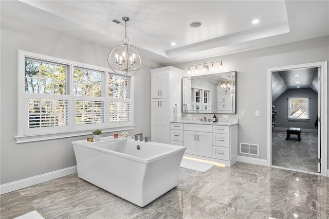 30 Lenihan Ln, East Greenwich, RI 02818 - bathroom featuring vanity, a freestanding bath, a chandelier, baseboards, and a tray ceiling