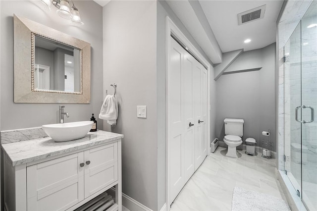 30 Lenihan Ln, East Greenwich, RI 02818 - bathroom with a shower stall, vanity, toilet, marble finish floors, and baseboards