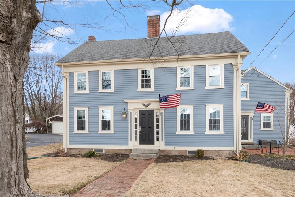 3261 Mendon Rd, Cumberland, RI 02864 - colonial inspired home with entry steps, a chimney, and a shingled roof