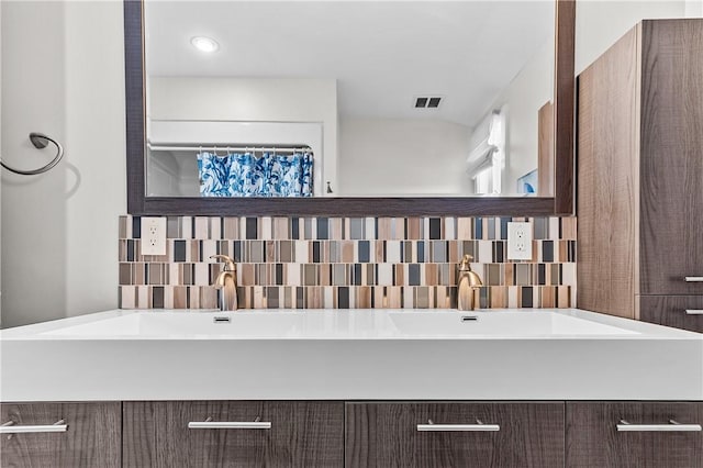 399 Atlantic Ave, Westerly, RI 02891 - full bathroom featuring backsplash and double vanity