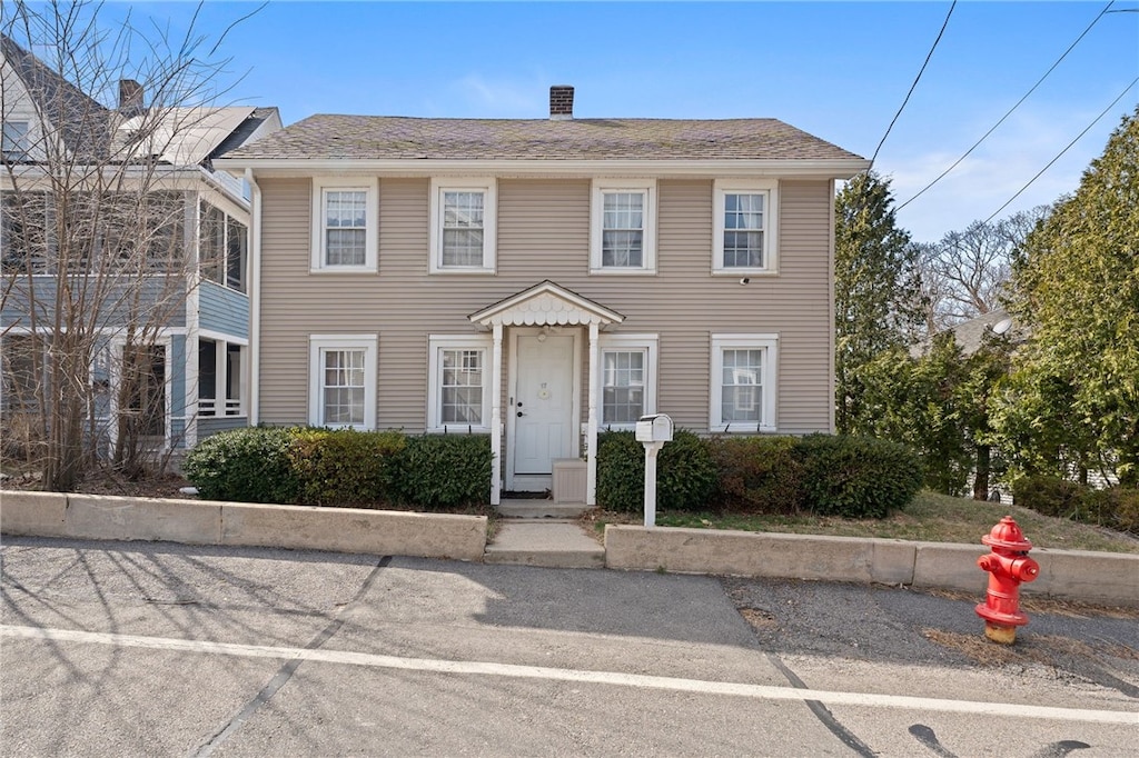 colonial home with a chimney