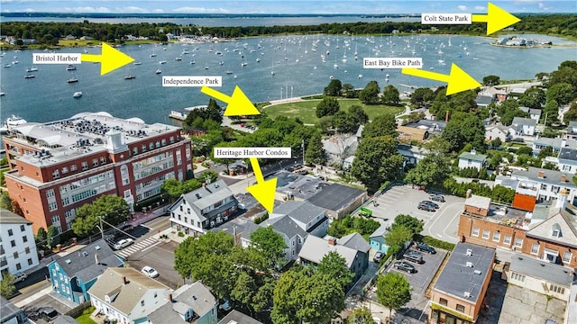 birds eye view of property with a water view