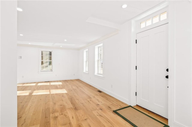 entrance foyer with visible vents, recessed lighting, light wood-type flooring, and baseboards